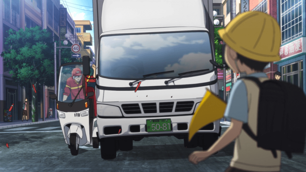Screenshot shows a truck coming right at a little boy in a yellow nursery-school hat. Image is from episode 1 of Erased